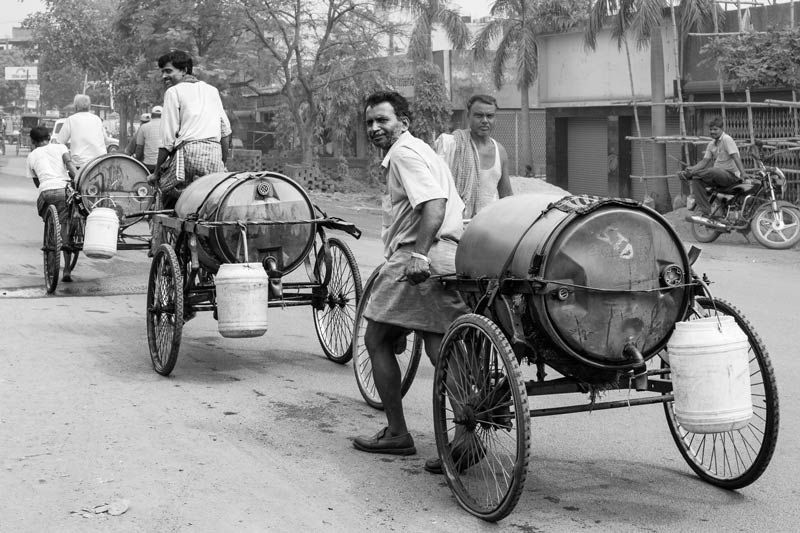 Small tankers supplying drinking water during  dry season in Dhanbad, Jharkhand, located in the heart of Jharia Coal Field. Groundwater in this town is in a 'critical' stage with  90-100% usage, a result of mining